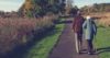 Elderly couple walking in country
